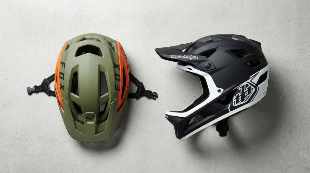 A half-shell helmet and a full-face mountain bike helmet side by side.