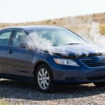 Phoenix driver checking engine coolant before summer travel