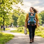 Plus-size mother wearing comfortable baby carrier in Pennsylvania park